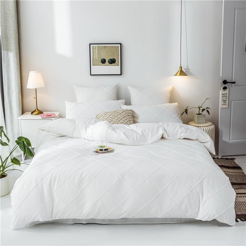 Charlotte Ultra Soft Microfiber Duvet Cover Set on a neatly made bed in a bright room, featuring minimalist decor and soft lighting.