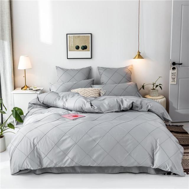 Charlotte Ultra Soft Microfiber Duvet Cover Set on stylish modern bed, offering all-season comfort and warmth, ideal substitute for goose down.