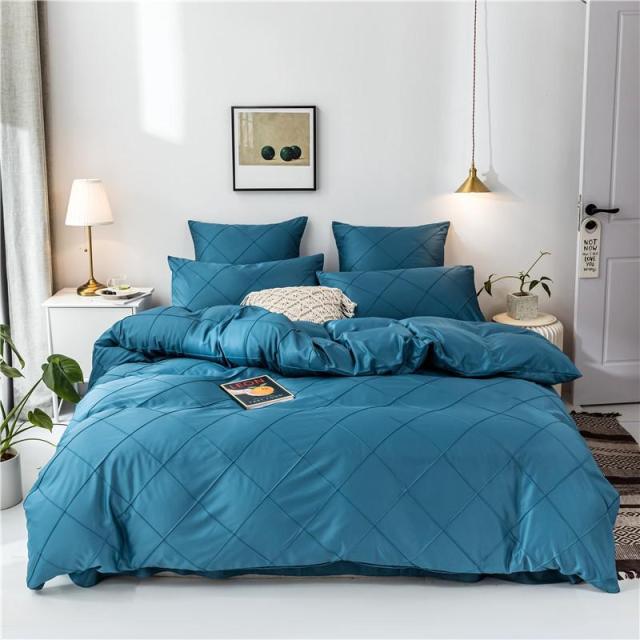 Charlotte Ultra Soft Microfiber Duvet Cover Set in blue on a neatly arranged bed with pillows and modern decor.