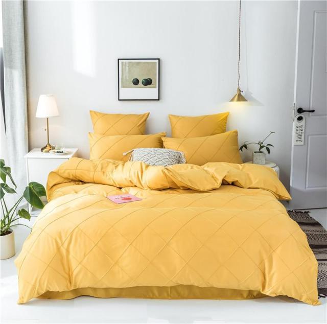 Charlotte Ultra Soft Microfiber Duvet Cover Set in yellow on bed with pillows in cozy modern bedroom