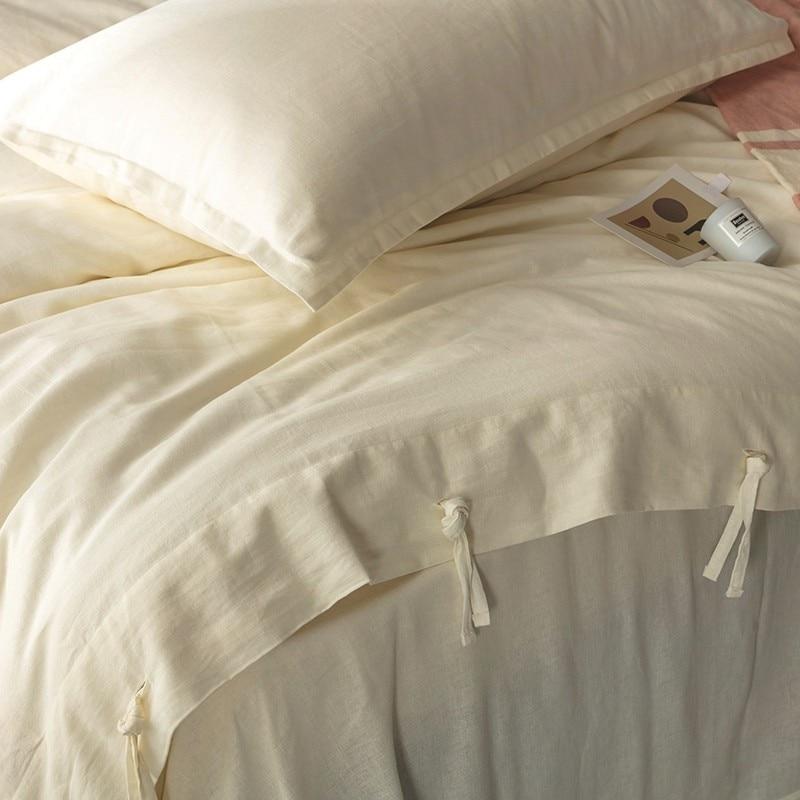 Emma Duvet Cover Set With Ropes 55% Cotton 45% Linen featuring soft luxurious bedding with ties, ideal for a cozy bedroom setup.