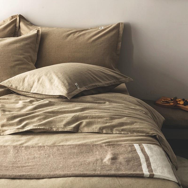 Emma Duvet Cover Set With Ropes 55% Cotton 45% Linen on a cozy bed setup with pillows