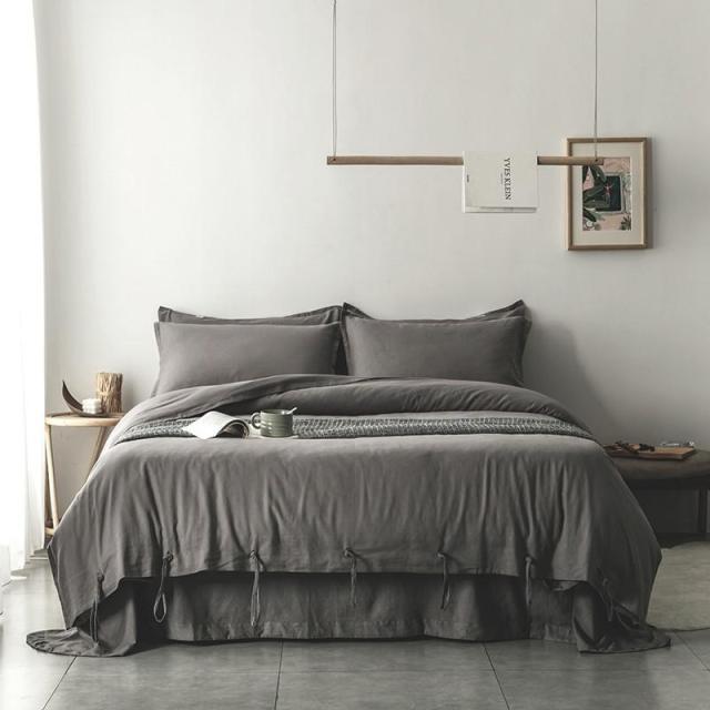 Emma Duvet Cover Set With Ropes 55% Cotton 45% Linen in a modern bedroom setting, showcasing luxurious comfort and style.