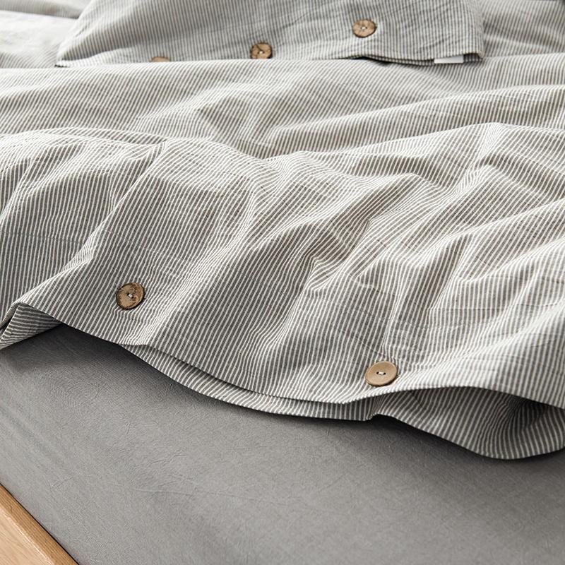 Olivia Stripe Ultra Soft Duvet Cover Set 100% Washed Cotton with buttons, showcasing its exceptional ultra softness on a bed