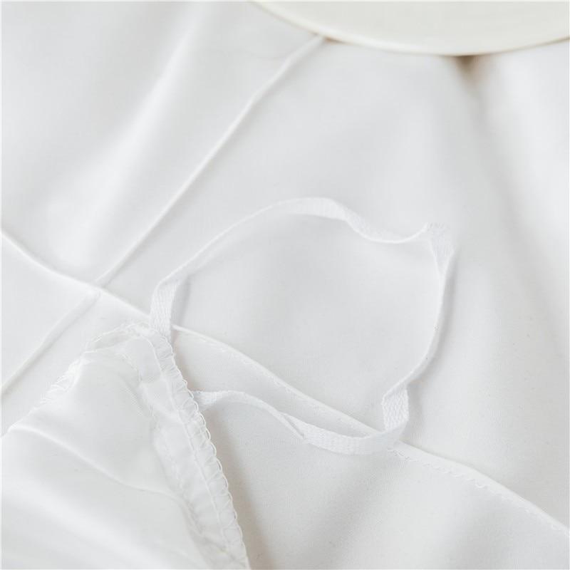 Close-up of white Charlotte Ultra Soft Microfiber Duvet Cover Set showing fabric texture and softness.