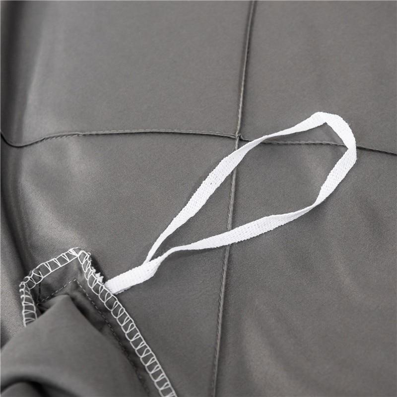 Close-up of Charlotte Ultra Soft Microfiber Duvet Cover Set showing stitching and tie for secure fit.