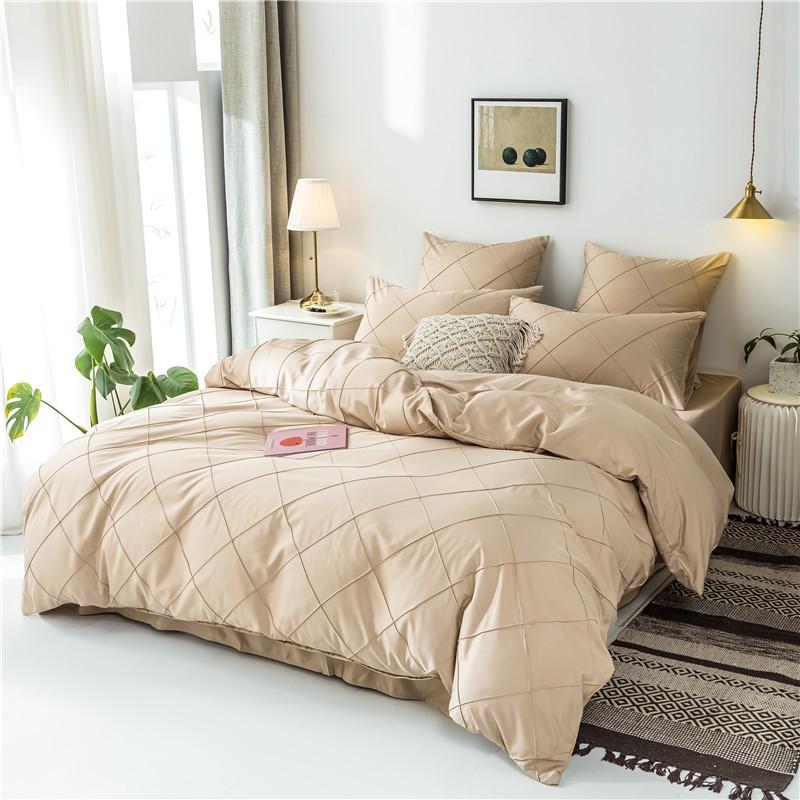 Charlotte Ultra Soft Microfiber Duvet Cover Set on a cozy bed in a bright room with decorative pillows and plants