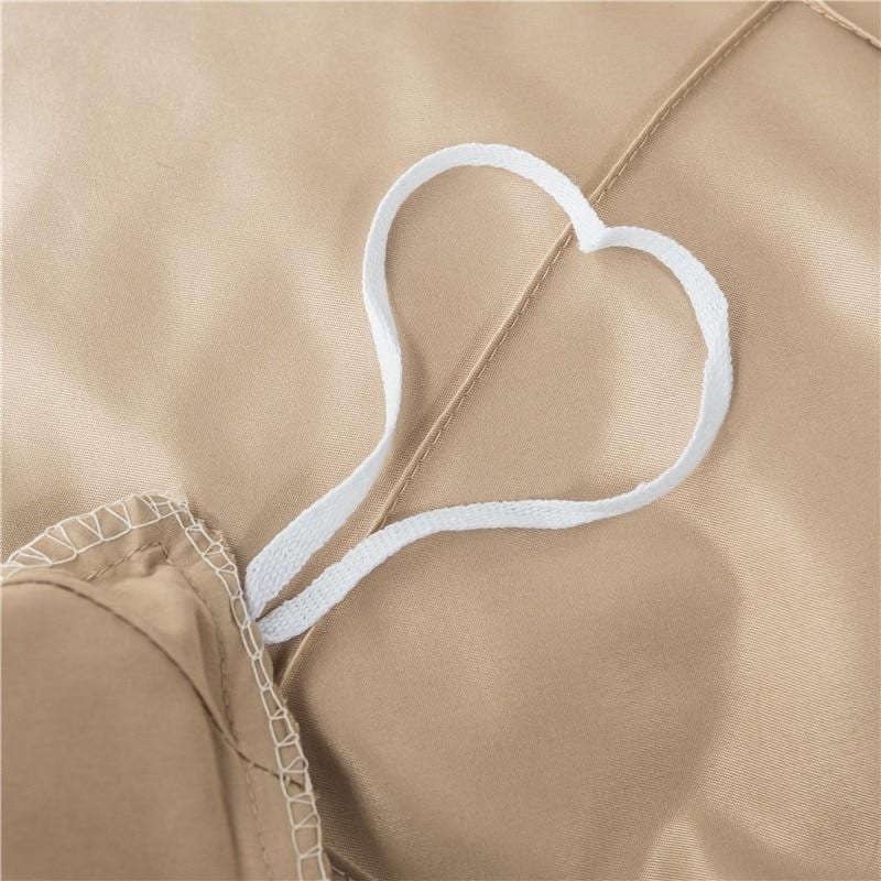 Tan Charlotte Ultra Soft Microfiber Duvet Cover Set showing corner tie feature for secure bedding placement.