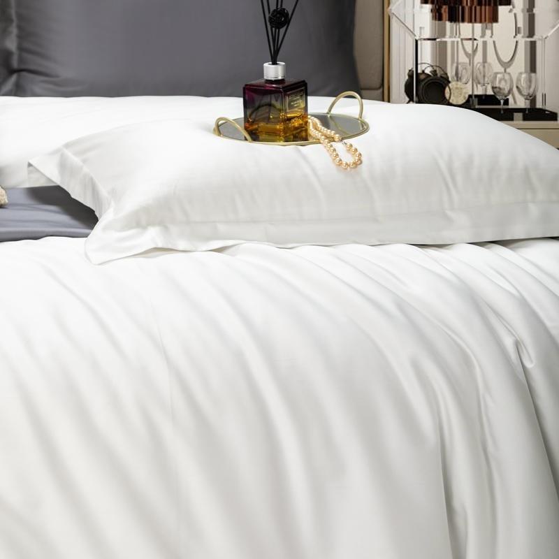 Juana Duvet Cover Set 1000TC (Egyptian Cotton) in white on a styled bed with decorative accents.