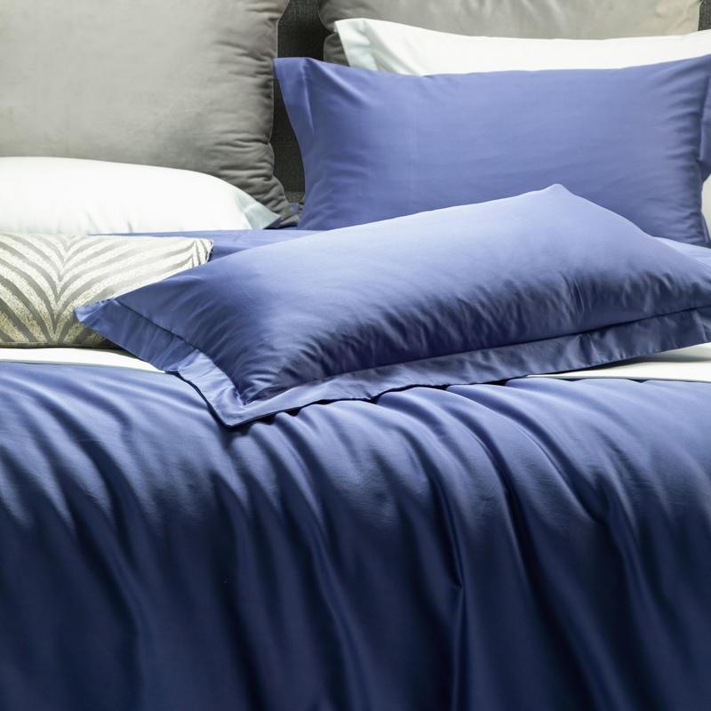 Juana Duvet Cover Set 1000TC (Egyptian Cotton) in blue on a neatly made bed with matching pillow.