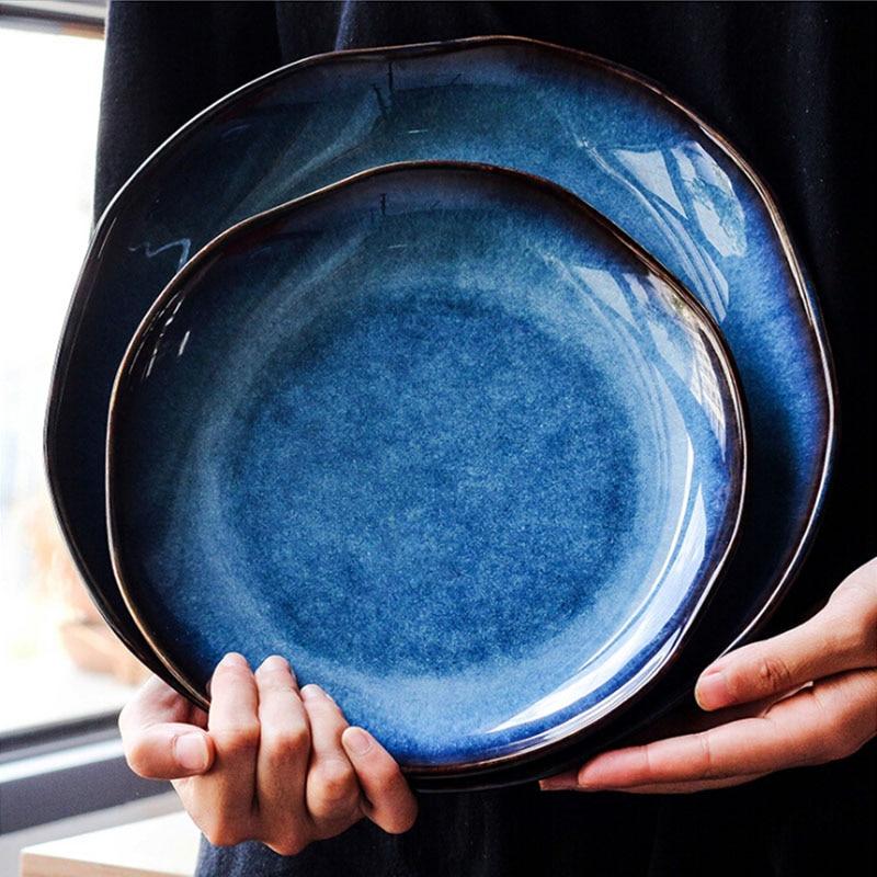 Ceramic Taygete Plate with solid pattern in a round shape, ideal for stylish dining.