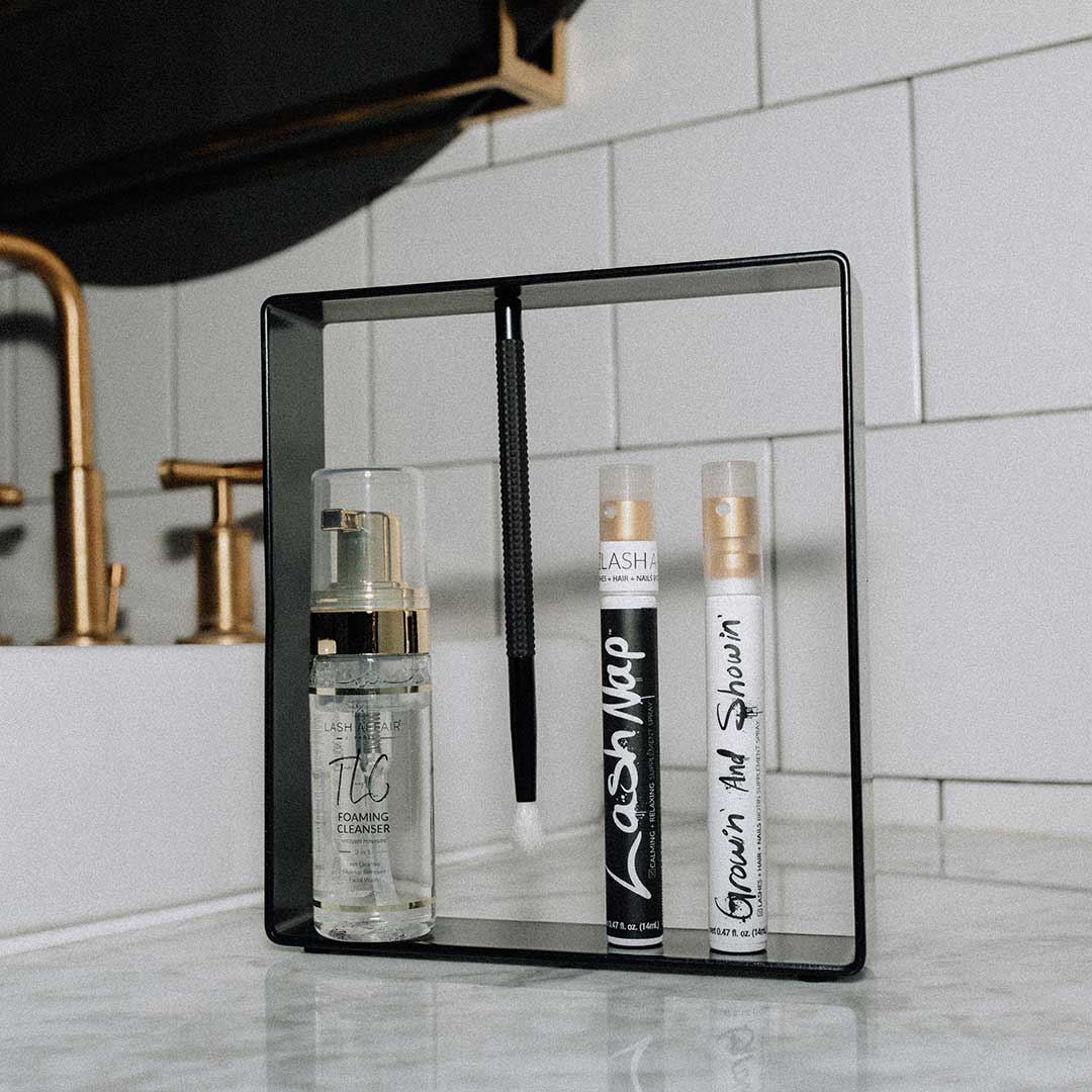 One Night Stand Magnetic Cleansing Brush Stand | Product Organizer | Brush Included in bathroom setting with lash products.