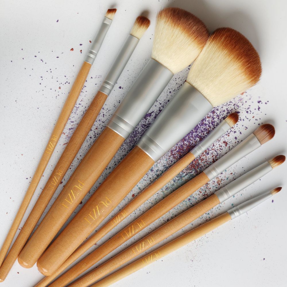 The Essential Brush Set featuring eight high-quality vegan makeup brushes designed for flawless looks.
