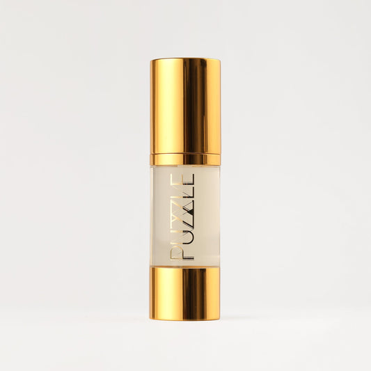PUZZLE Makeup Remover in gold bottle for gentle, vegan makeup removal