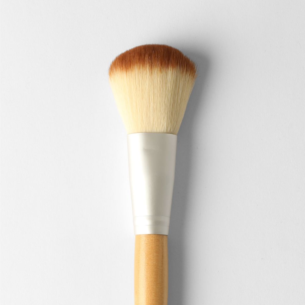 Vegan Powder Brush for smooth, polished finish; eco-friendly, compact, and easy to clean makeup tool with durable bristles.