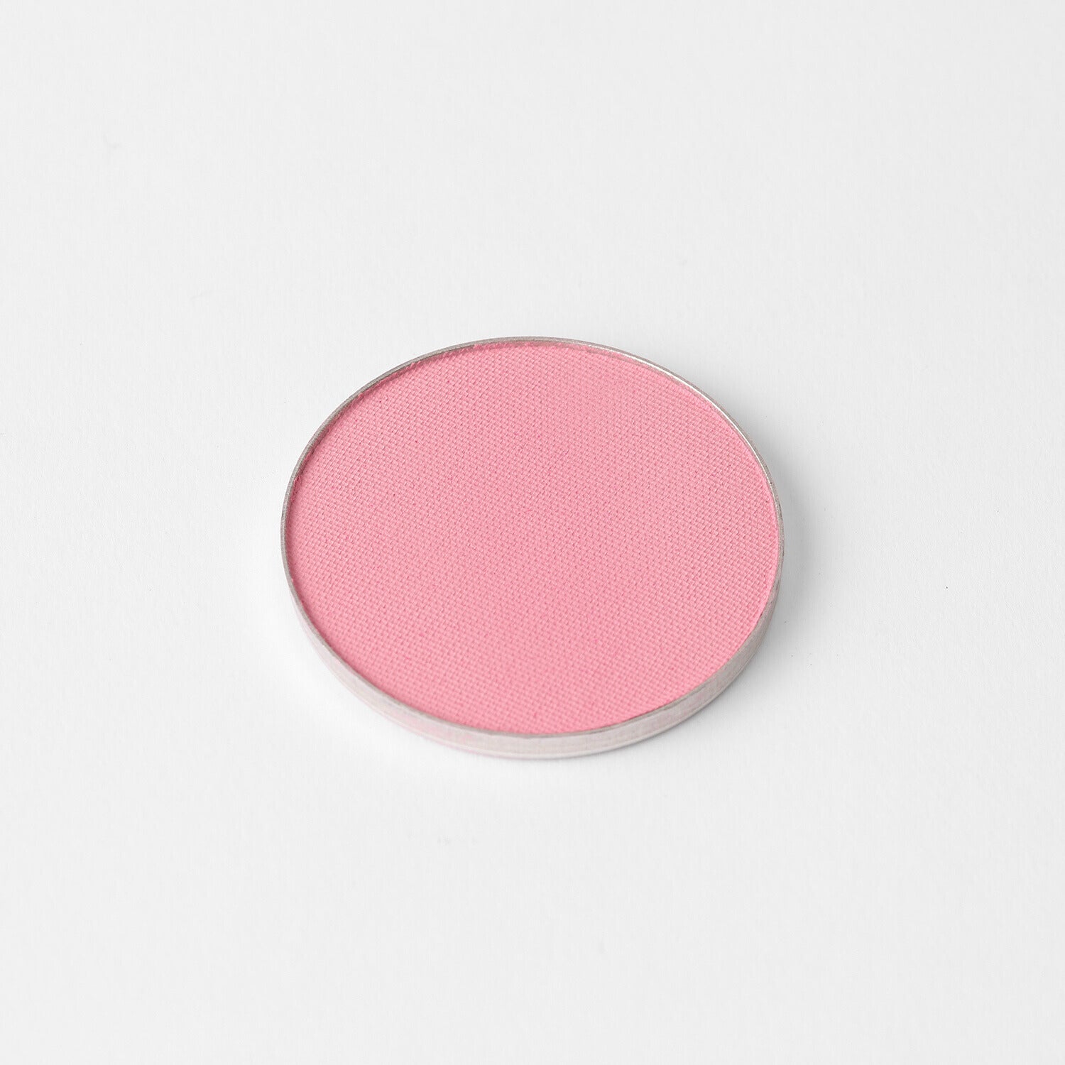 Vegan blush in pink shade, perfect for skin tone customization. Snaps into magnetic palette. Blush for vibrant, blendable color.