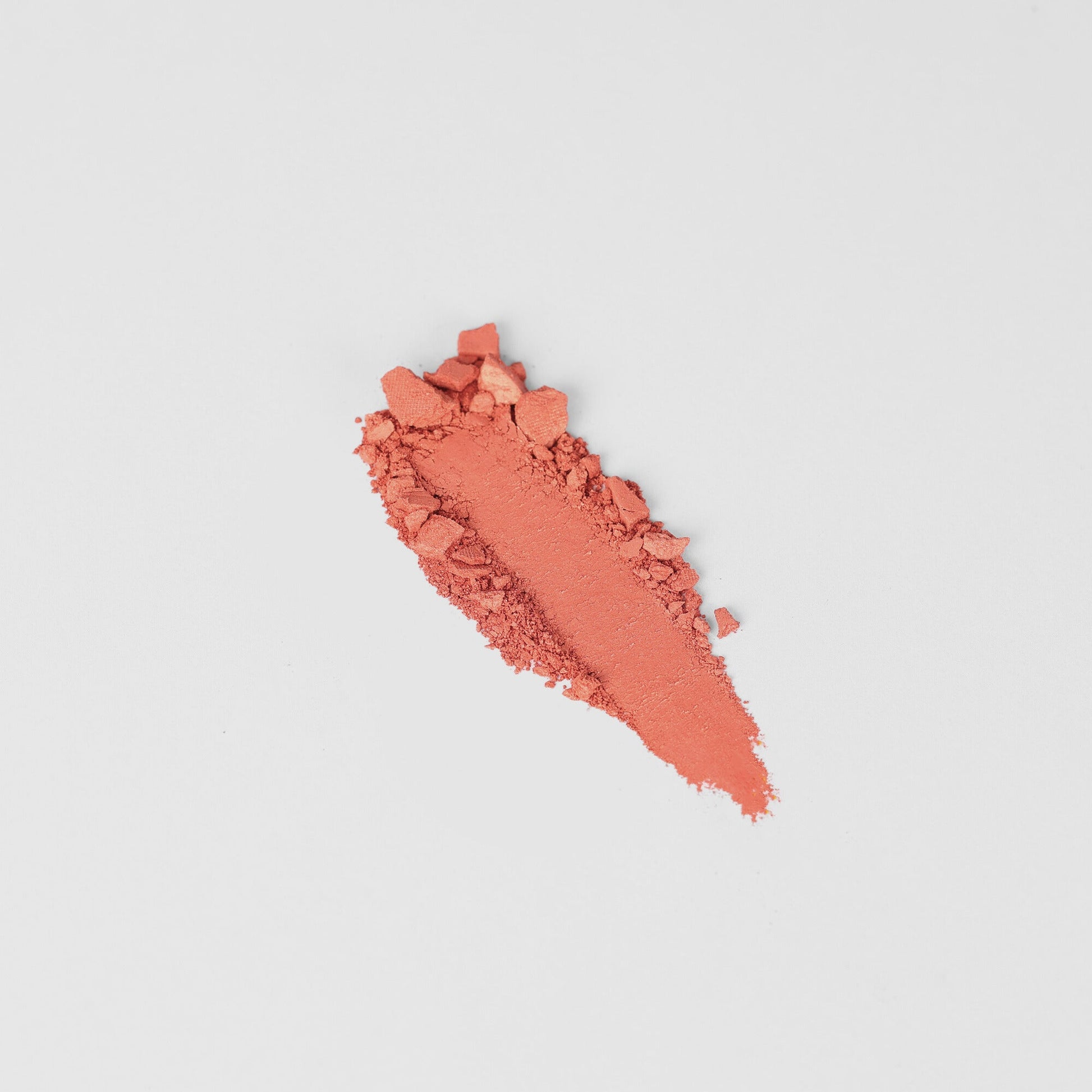 Blush swatch showcasing blendable vegan formula in a vibrant shade, perfect for all skin tones, compatible with Magnetic Palette.