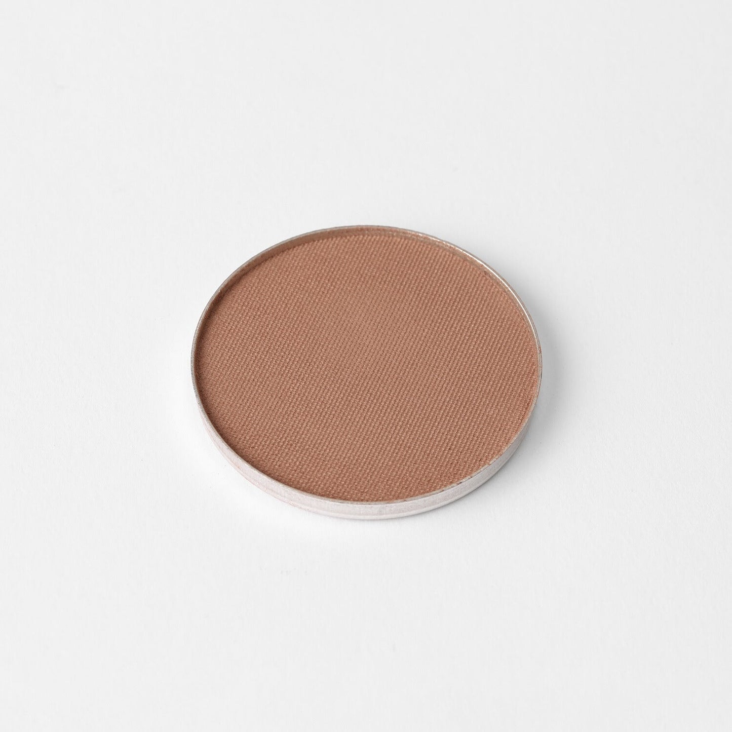 Vegan matte bronzer pan for sun-kissed warmth and dimension, fits magnetic palettes, buildable and blendable formula.