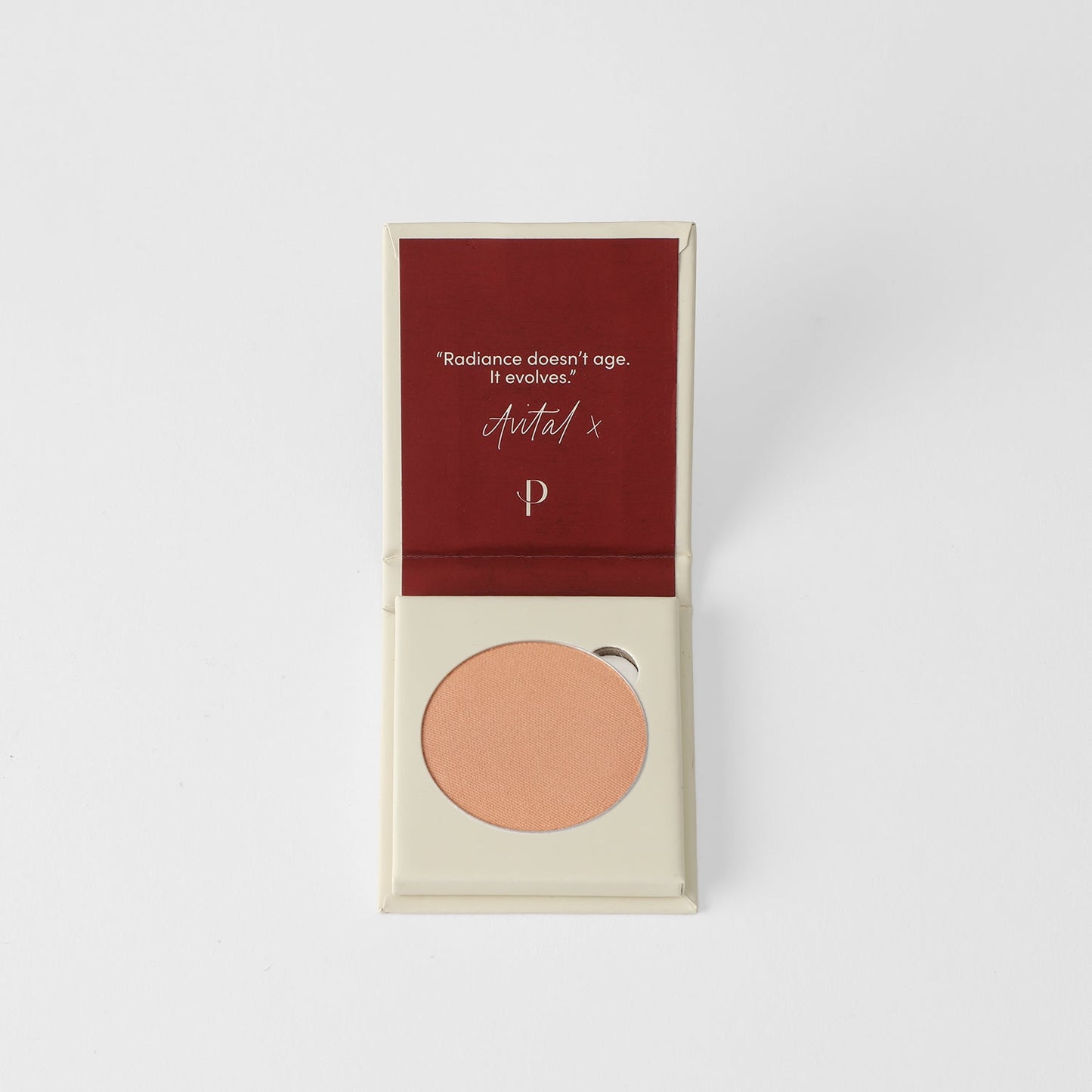 Vegan bronzer in open compact with quote, perfect for natural warmth and dimension, fits magnetic palettes.