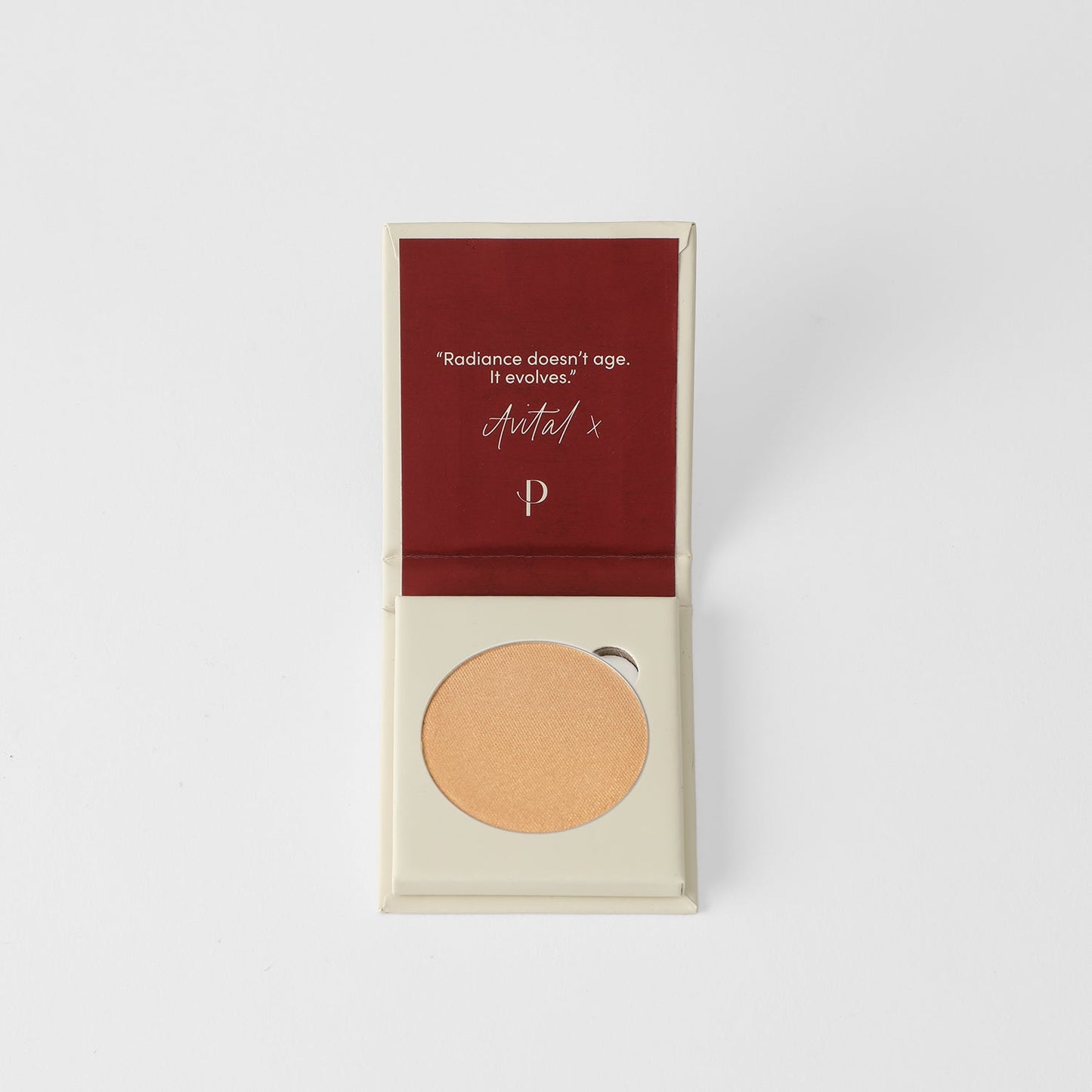 Bronzer in package with quote "Radiance doesn't age, it evolves." Ideal for a sun-kissed glow, vegan, matte or subtle shimmer options.