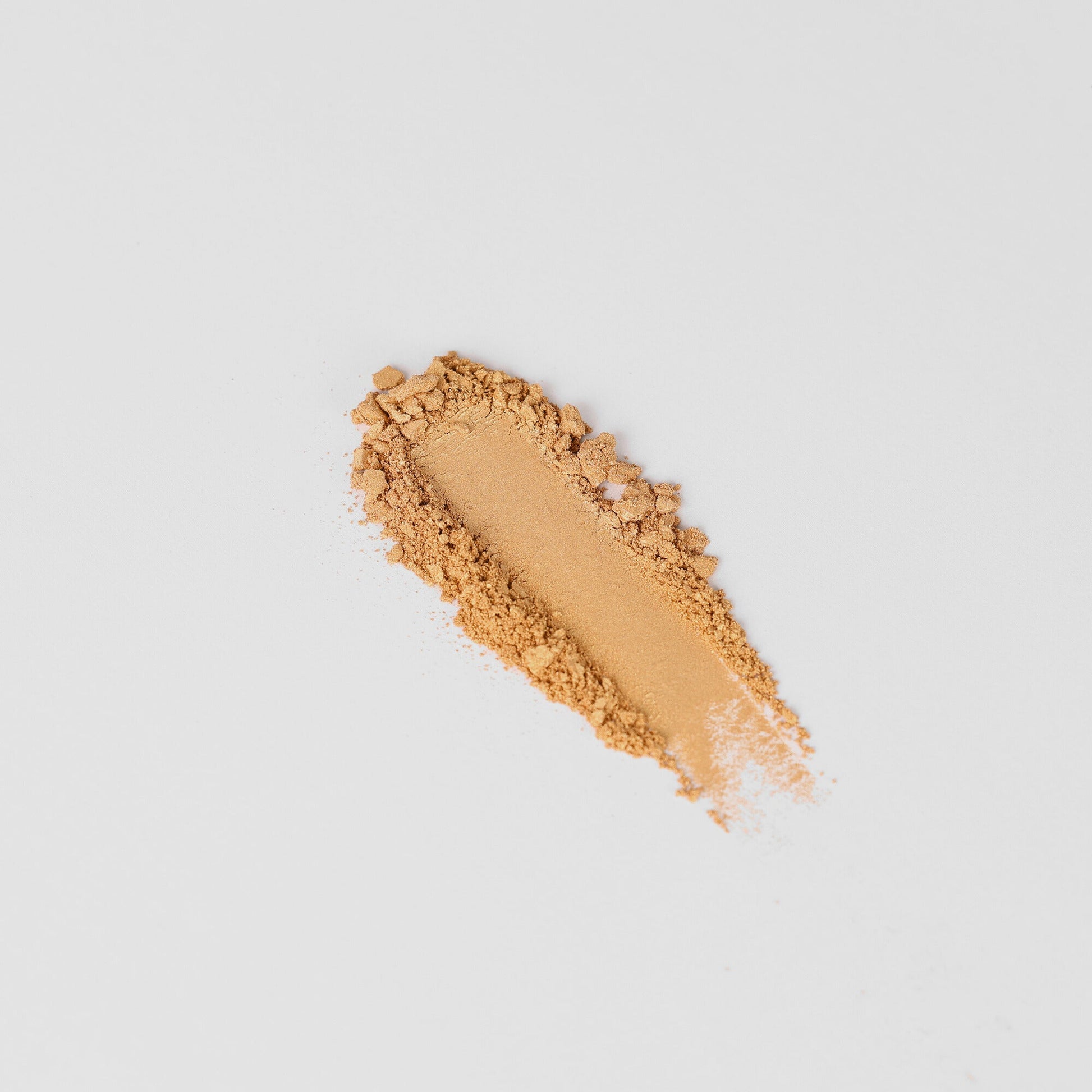 Vegan Bronzer swatch in matte finish, perfect for a buildable sun-kissed glow and sculpted definition, compatible with magnetic palettes.