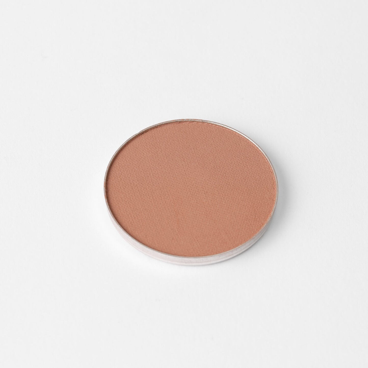 Vegan bronzer pan with a matte finish, perfect for customizable magnetic palettes.