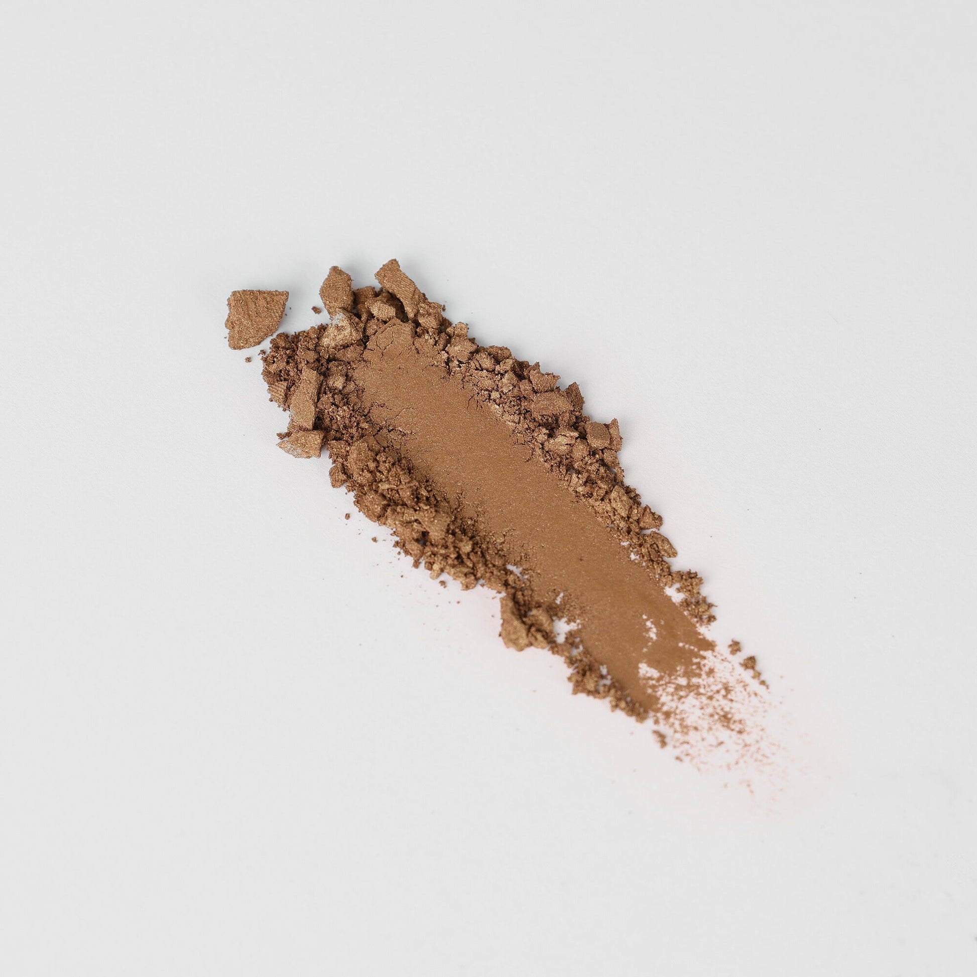Bronzer swatch showcasing vegan matte formula for a natural, buildable sun-kissed glow. Ideal for easy integration into magnetic palettes.