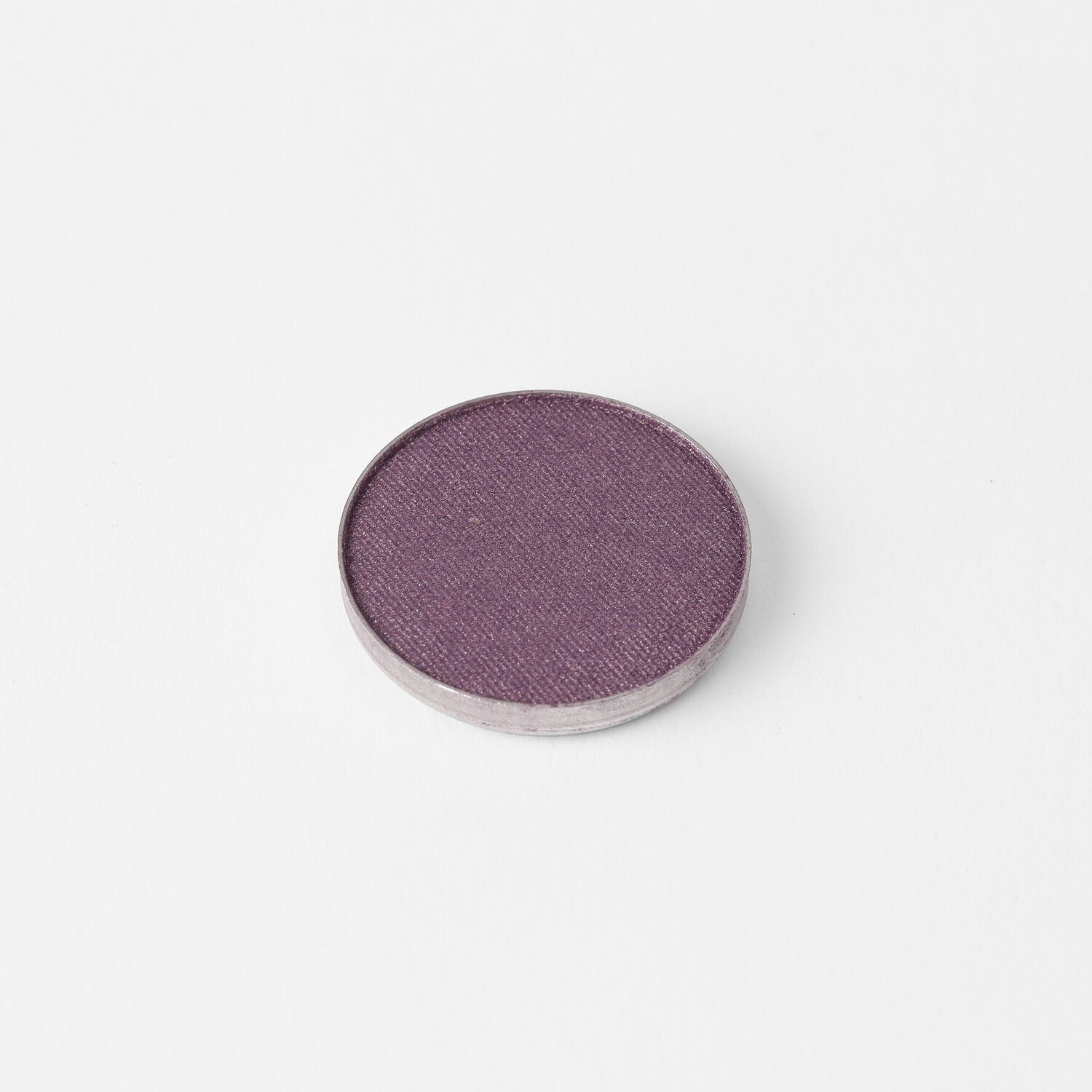 Single pan of Glow Pressed Eyeshadow in a rich, vibrant purple shade on a white background.