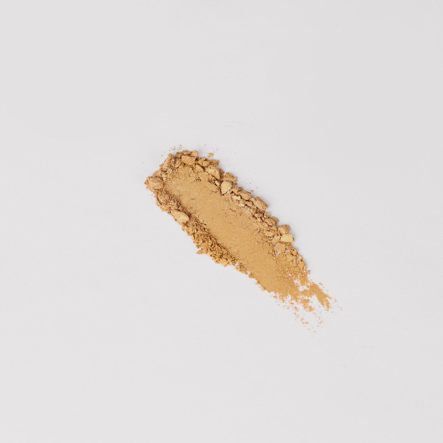 Glow Pressed Eyeshadow swatch showing rich vegan pigments for a luminous, buildable glow.