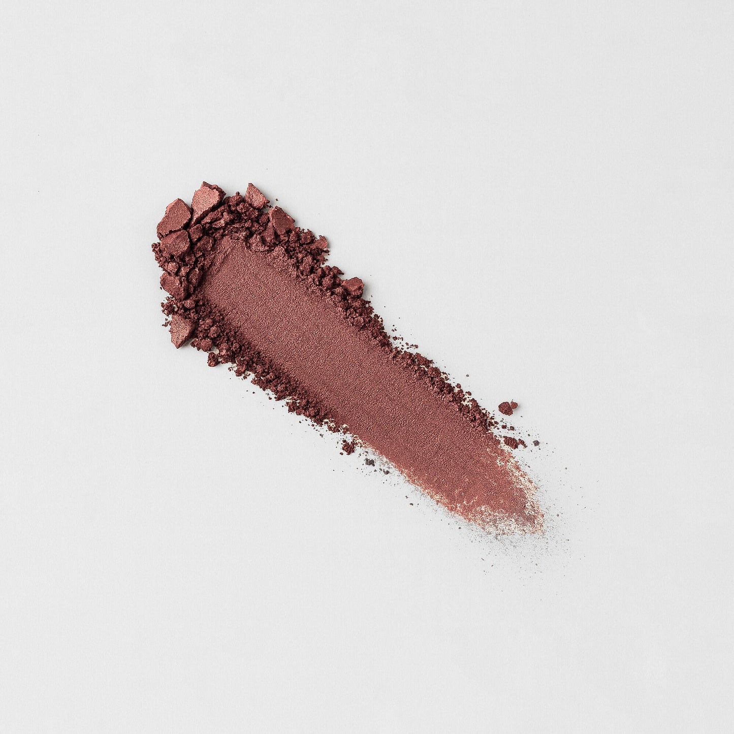 Glow Pressed Eyeshadow swatch on white background, showcasing rich vegan pigments for multi-use application.