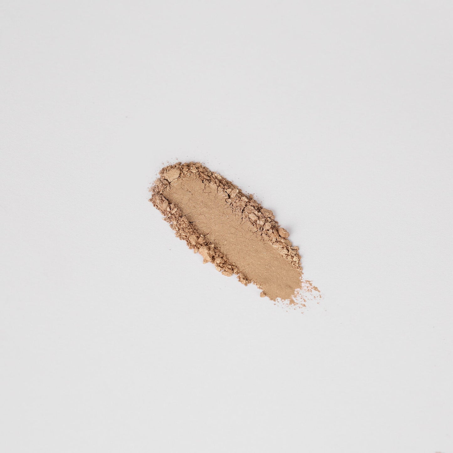 Glow Pressed Eyeshadow swatch showing smooth, blendable, long-lasting vegan pigments for a luminous finish.