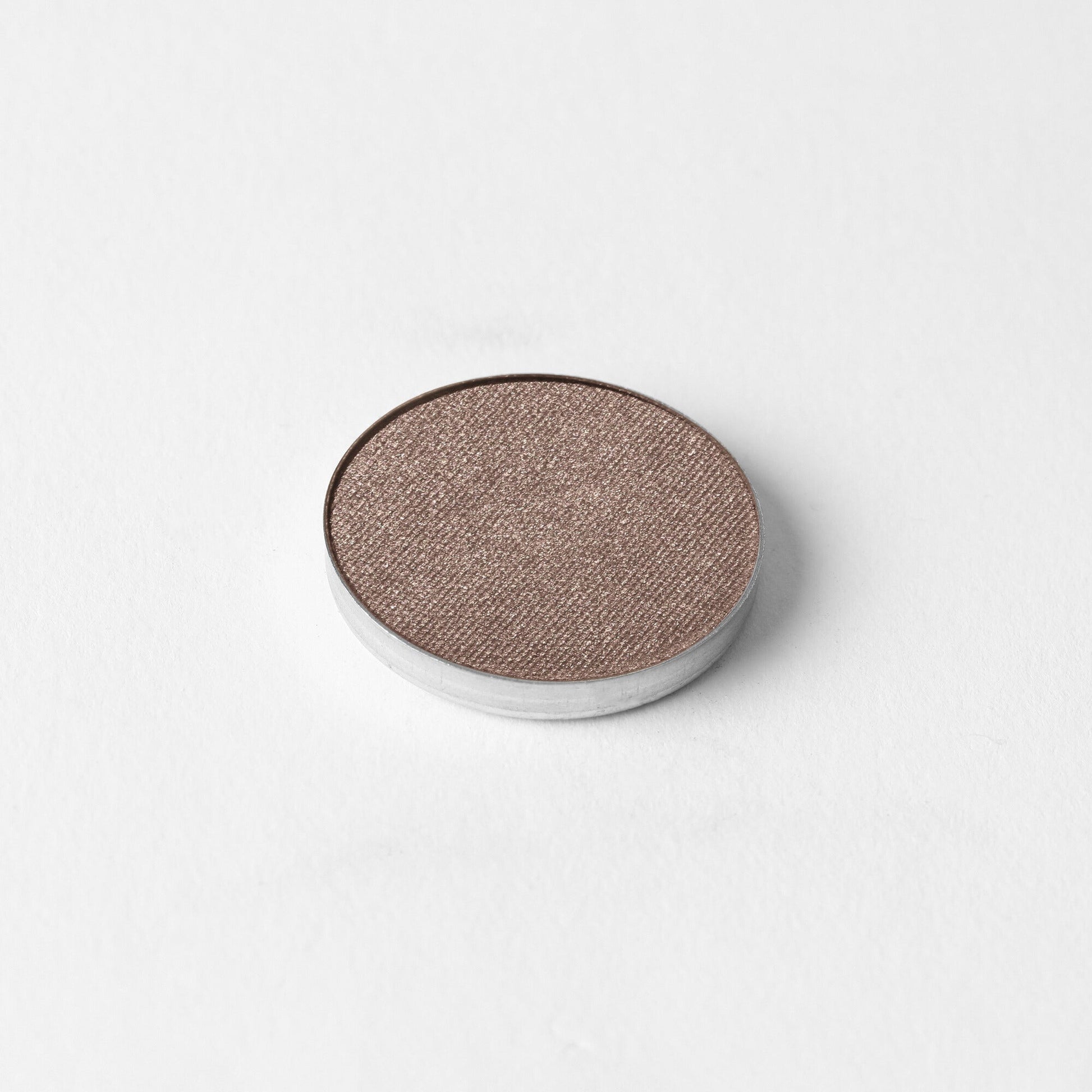 Glow Pressed Eyeshadow, luminous vegan shadow with rich pigments, smooth application, ideal for soft shimmer or detailed definition.