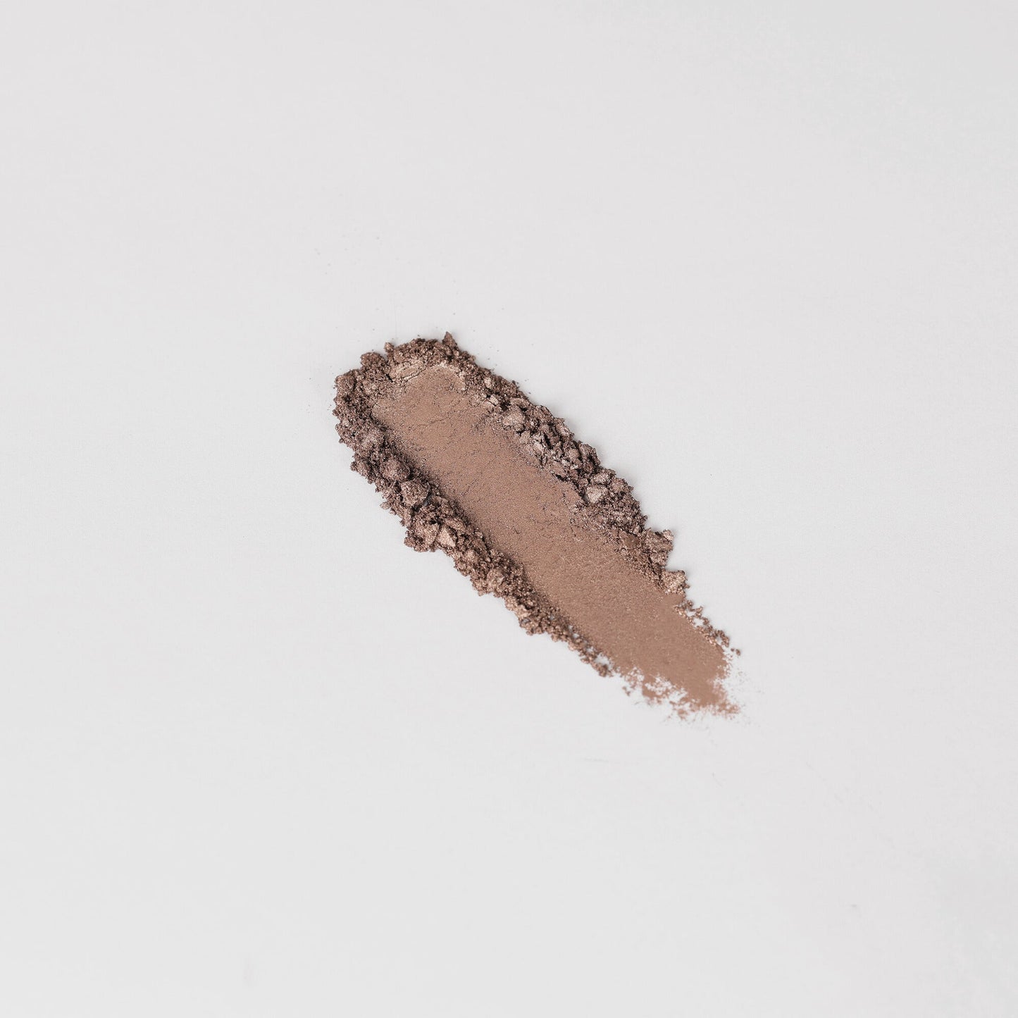 Swatch of Glow Pressed Eyeshadow showcasing rich vegan pigments and smooth texture