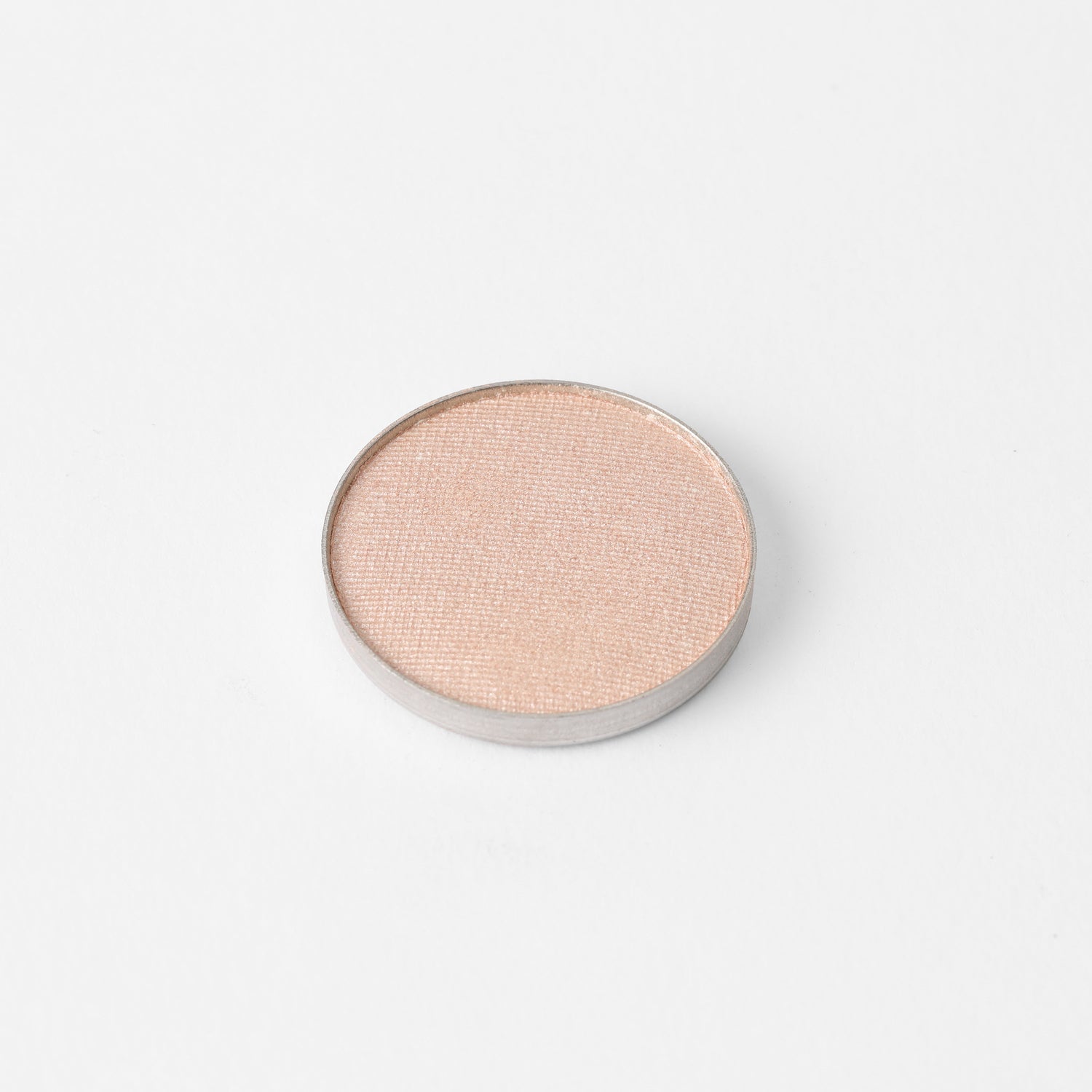 Glow Pressed Eyeshadow in pan with soft shimmer, vegan pigments; blendable, buildable, multi-use eyeshadow for defining and illuminating.