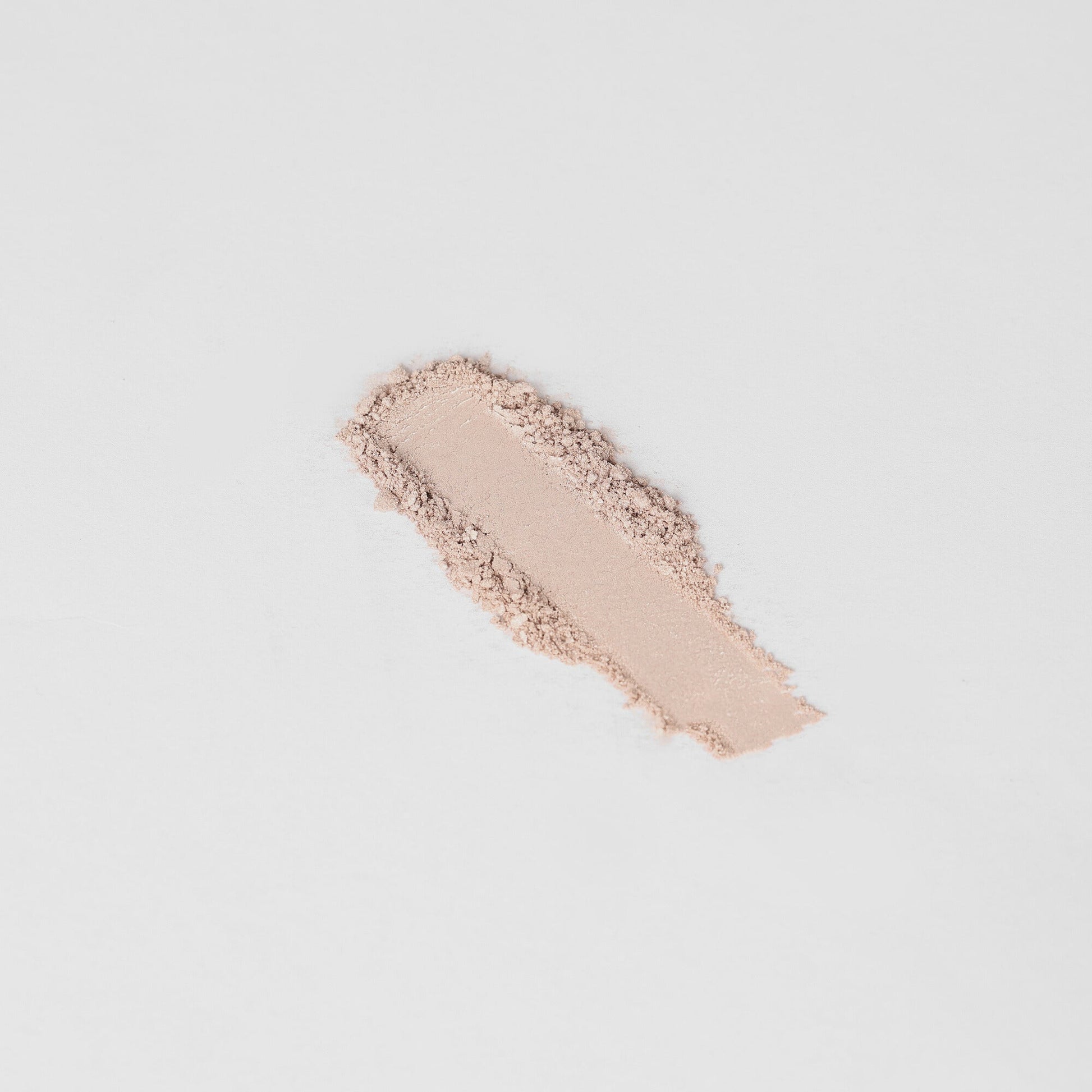 Glow Pressed Eyeshadow swatch showing creamy and luminous texture.