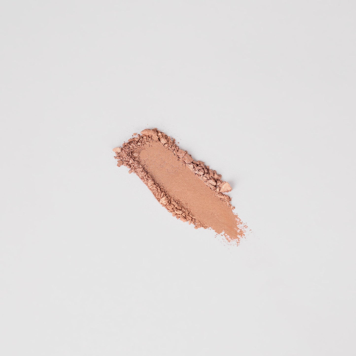 Glow Pressed Eyeshadow swatch showing luminous vegan pigment.