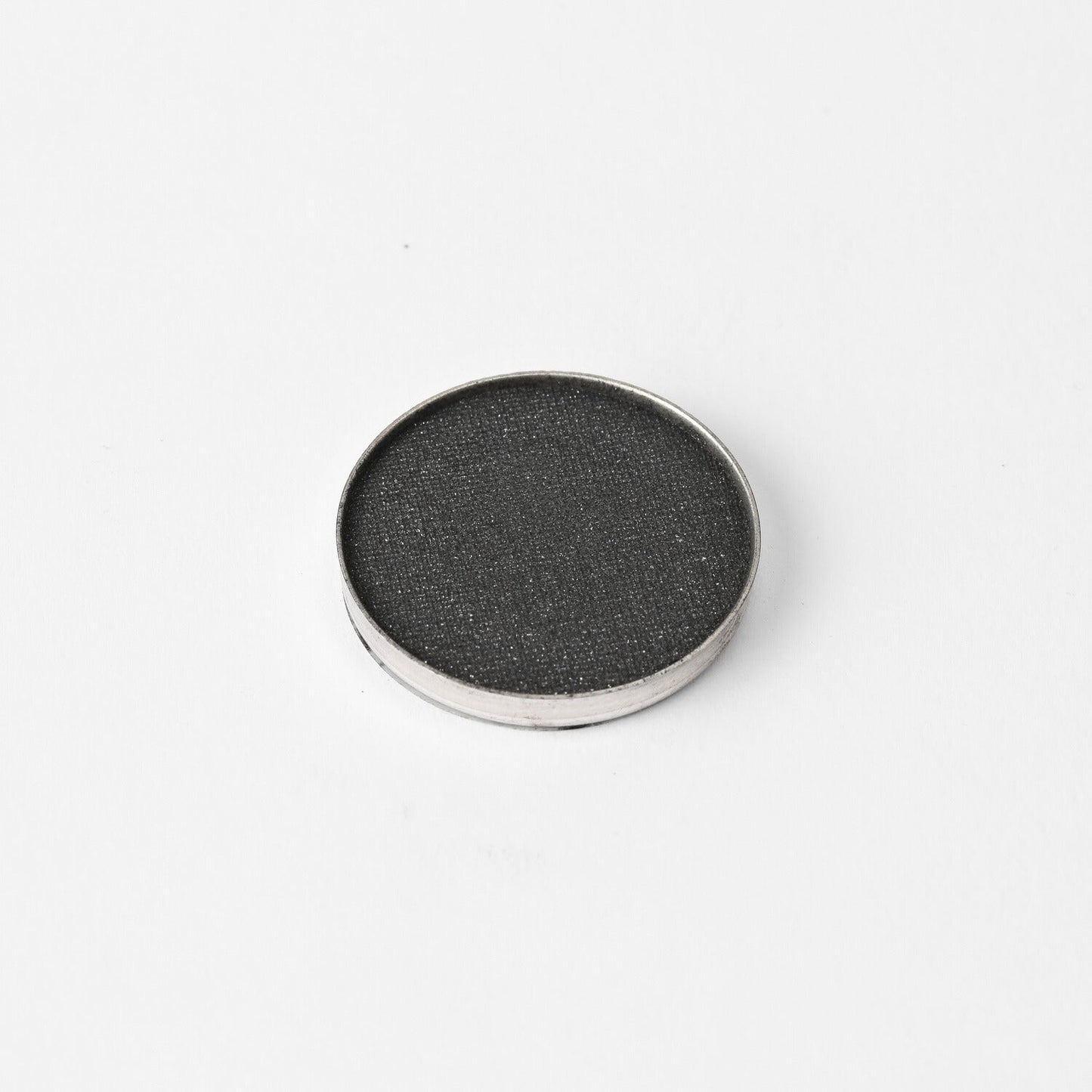 Glow Pressed Eyeshadow single pan with rich vegan pigments for buildable, long-lasting shimmer and definition.