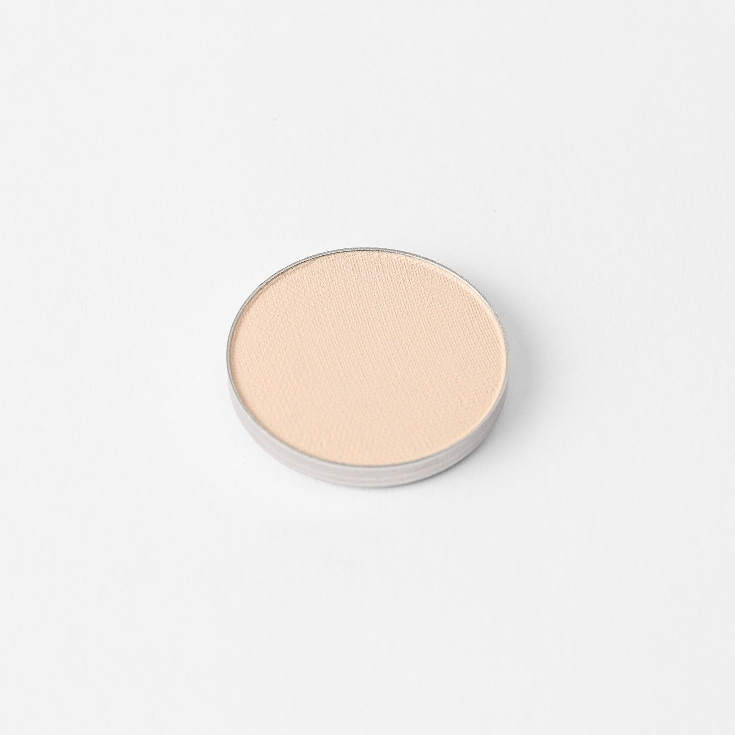 Glow Pressed Eyeshadow pan with vegan pigments for smooth application and multi-use shimmer in a compact design