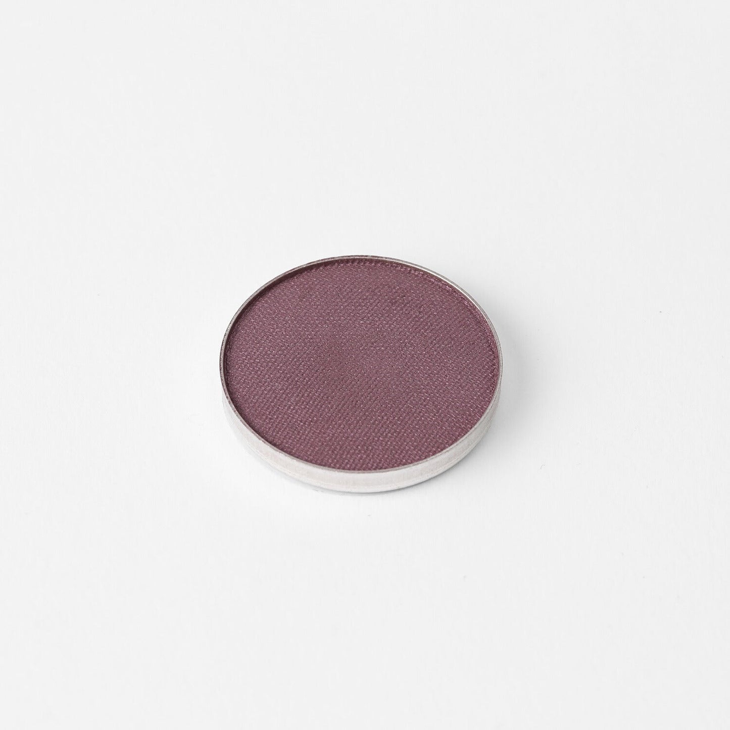 Glow Pressed Eyeshadow in rich purple hue, vegan and buildable for subtle to bold looks.