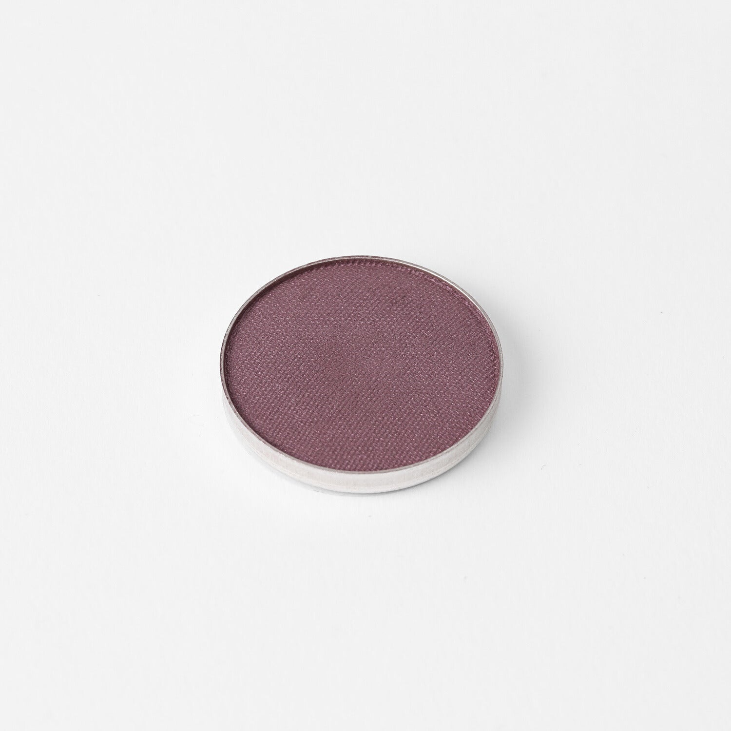Glow Pressed Eyeshadow in rich purple hue, vegan and buildable for subtle to bold looks.
