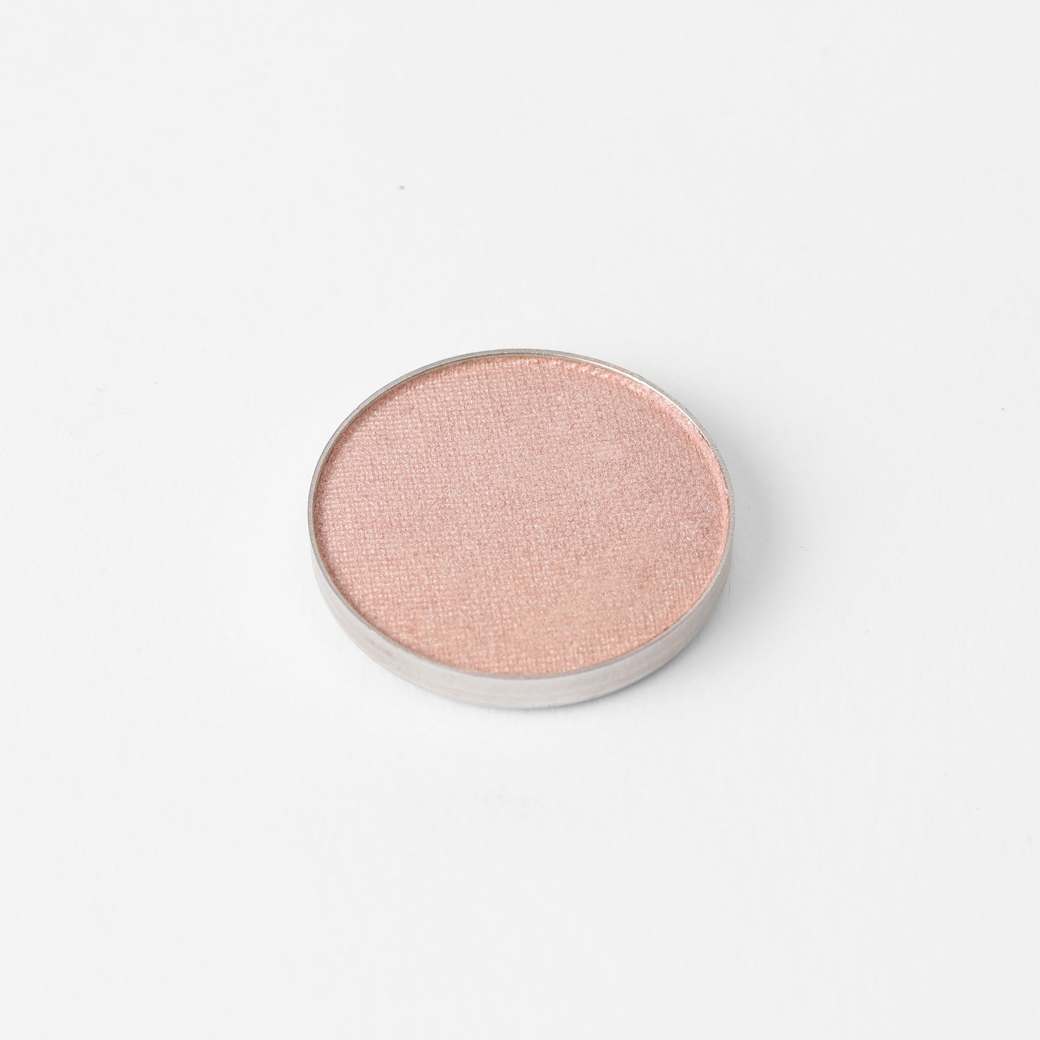 Glow Pressed Eyeshadow in a round pan, luminous vegan pigment