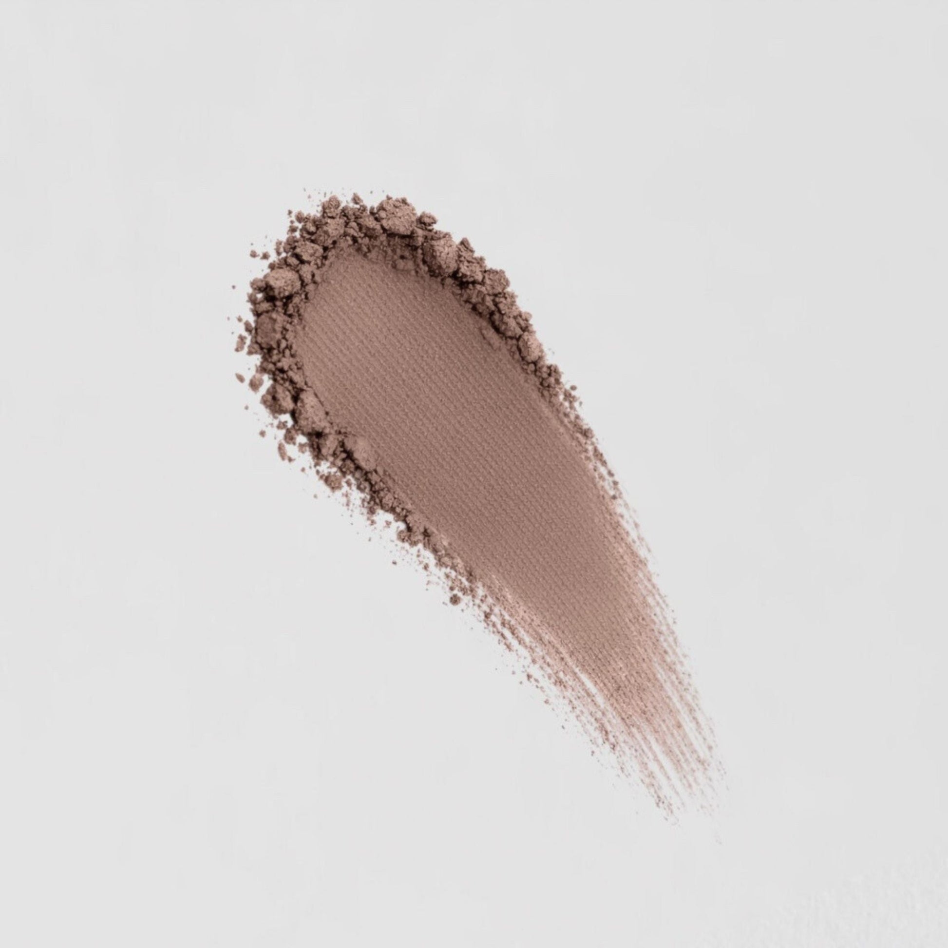 Swatch of Glow Pressed Eyeshadow showing smooth and blendable vegan pigment.