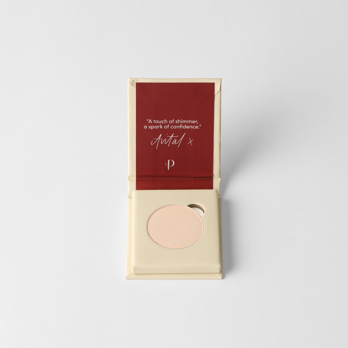Glow Pressed Eyeshadow in packaging open showing shimmering pan for subtle or bold looks, vegan pigments, buildable and long-lasting.