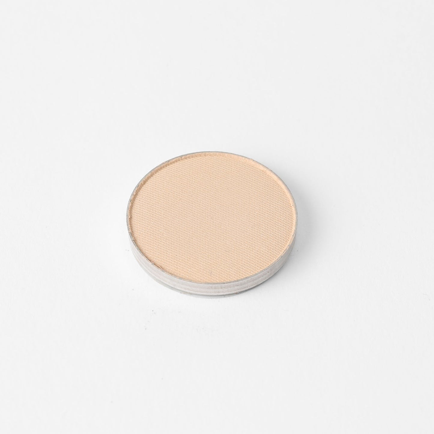 Glow Pressed Eyeshadow in a single pan, featuring luminous vegan pigment for long-lasting shimmer and definition.