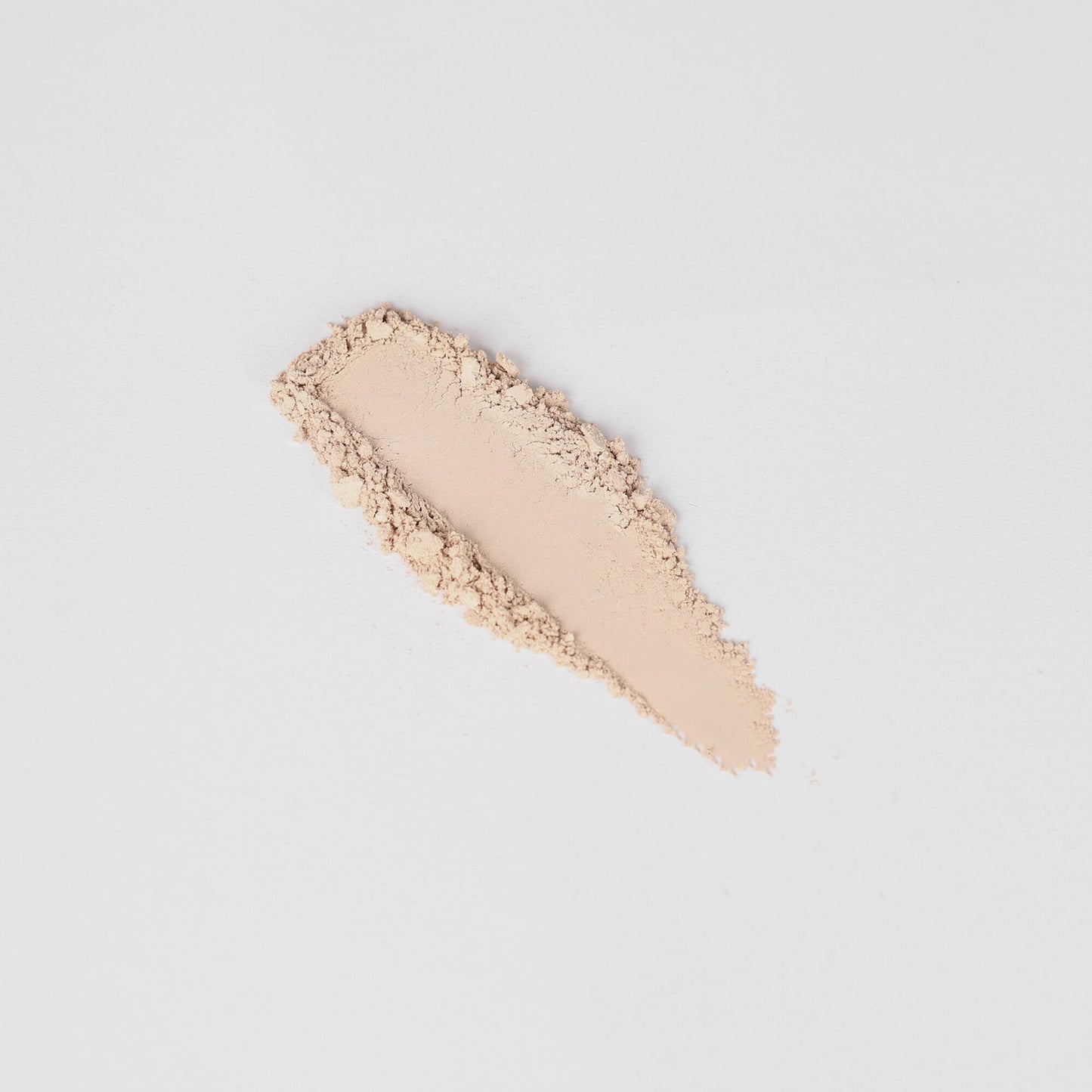 Glow Pressed Eyeshadow swatch showing smooth blendable texture in a light shimmer shade on a white background.
