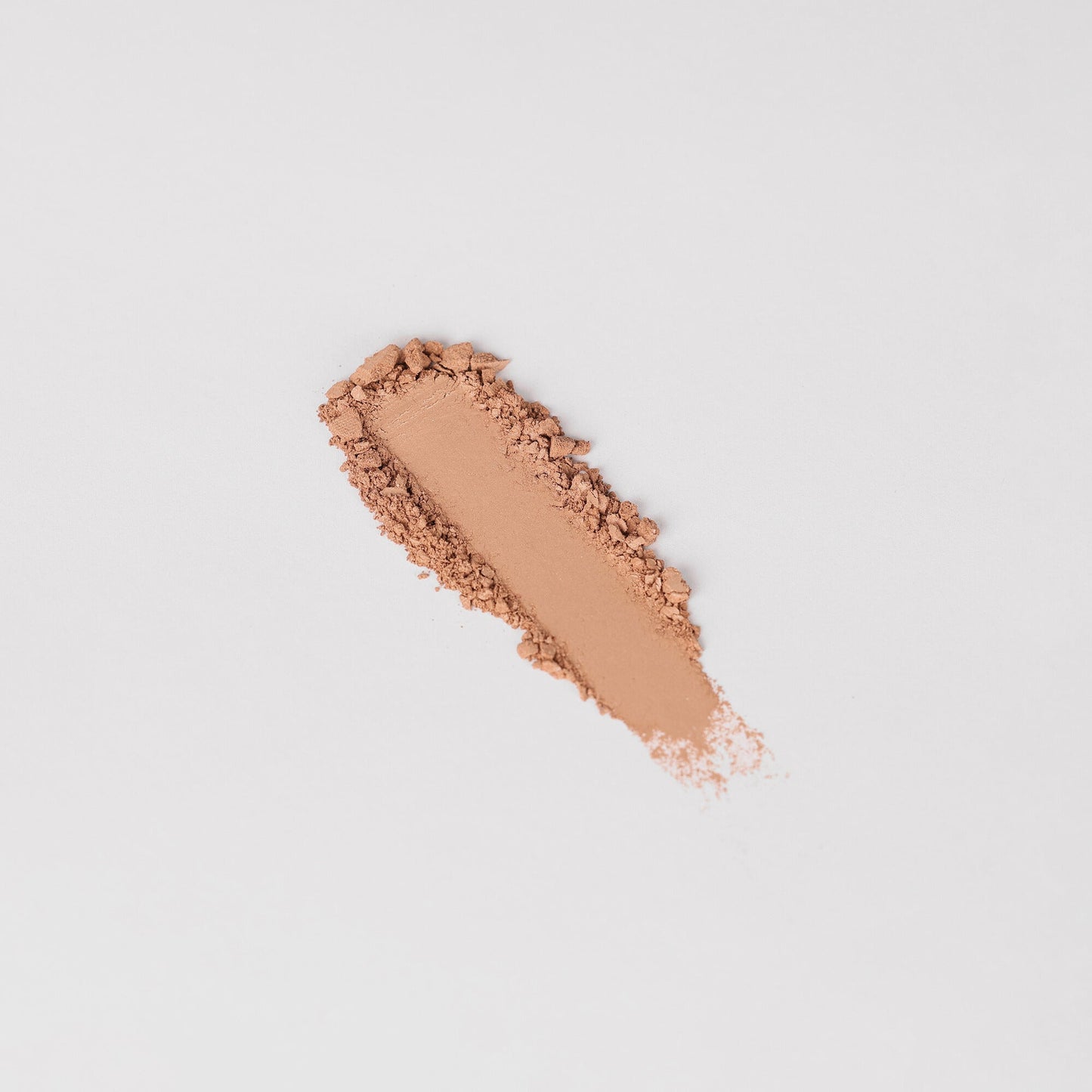 Glow Pressed Eyeshadow swatch showcasing rich vegan pigments and smooth application.