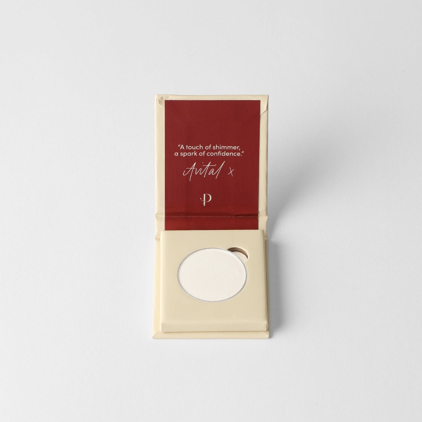 Glow Pressed Eyeshadow in elegant packaging, showcasing luminous vegan pigment for buildable, long-lasting shimmer and definition.