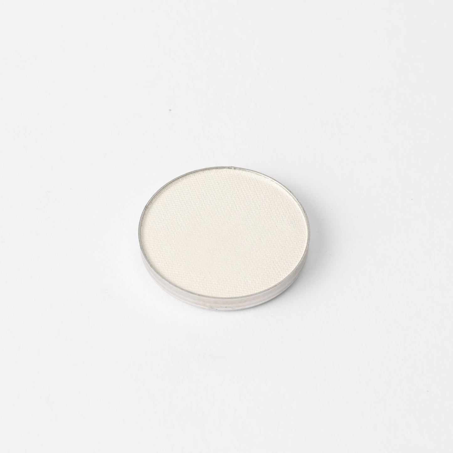 Glow Pressed Eyeshadow pan with creamy vegan pigments, perfect for a luminous look. Long-lasting and blendable, ideal for any makeup style.