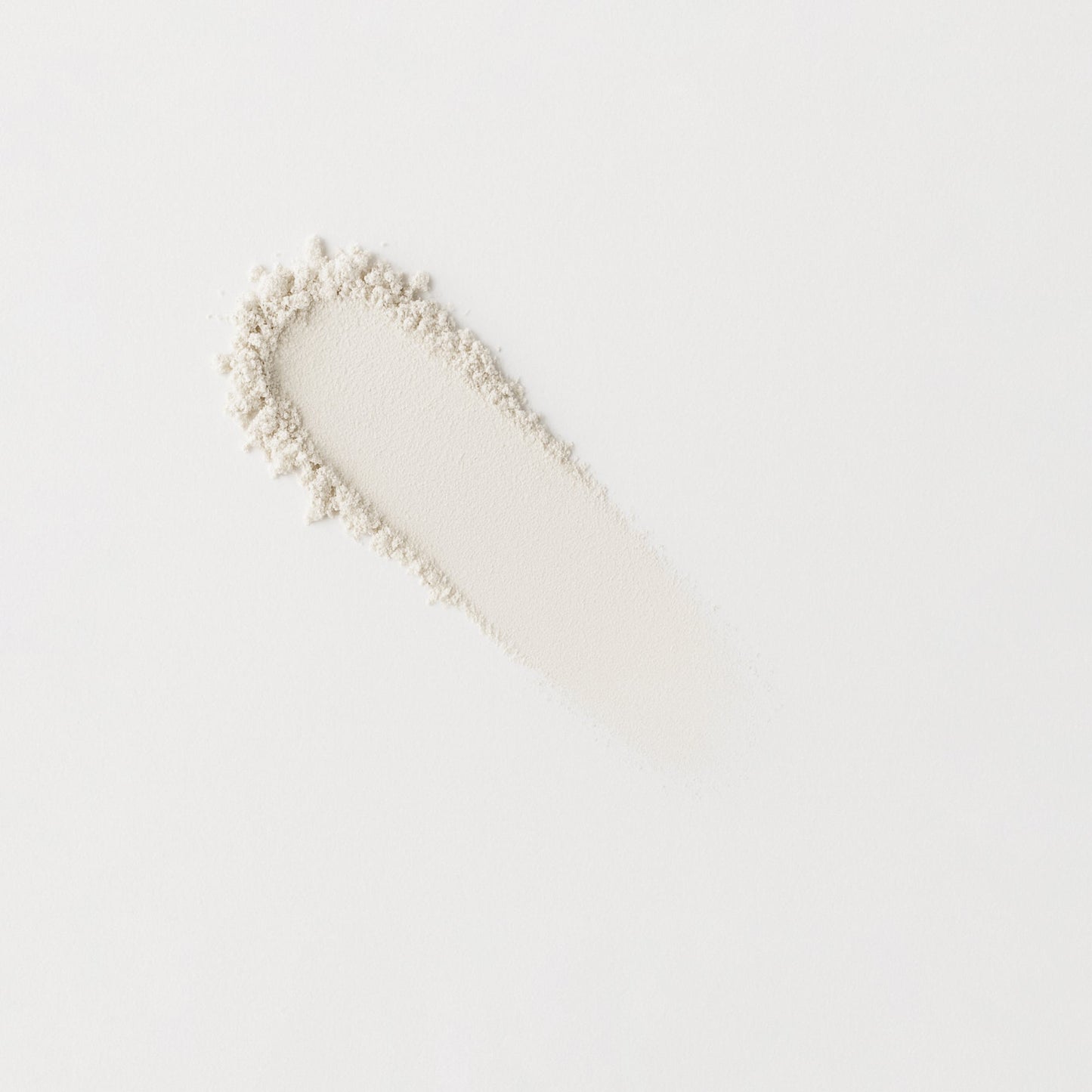 Swatch of Glow Pressed Eyeshadow in a smooth, luminous finish on a white background