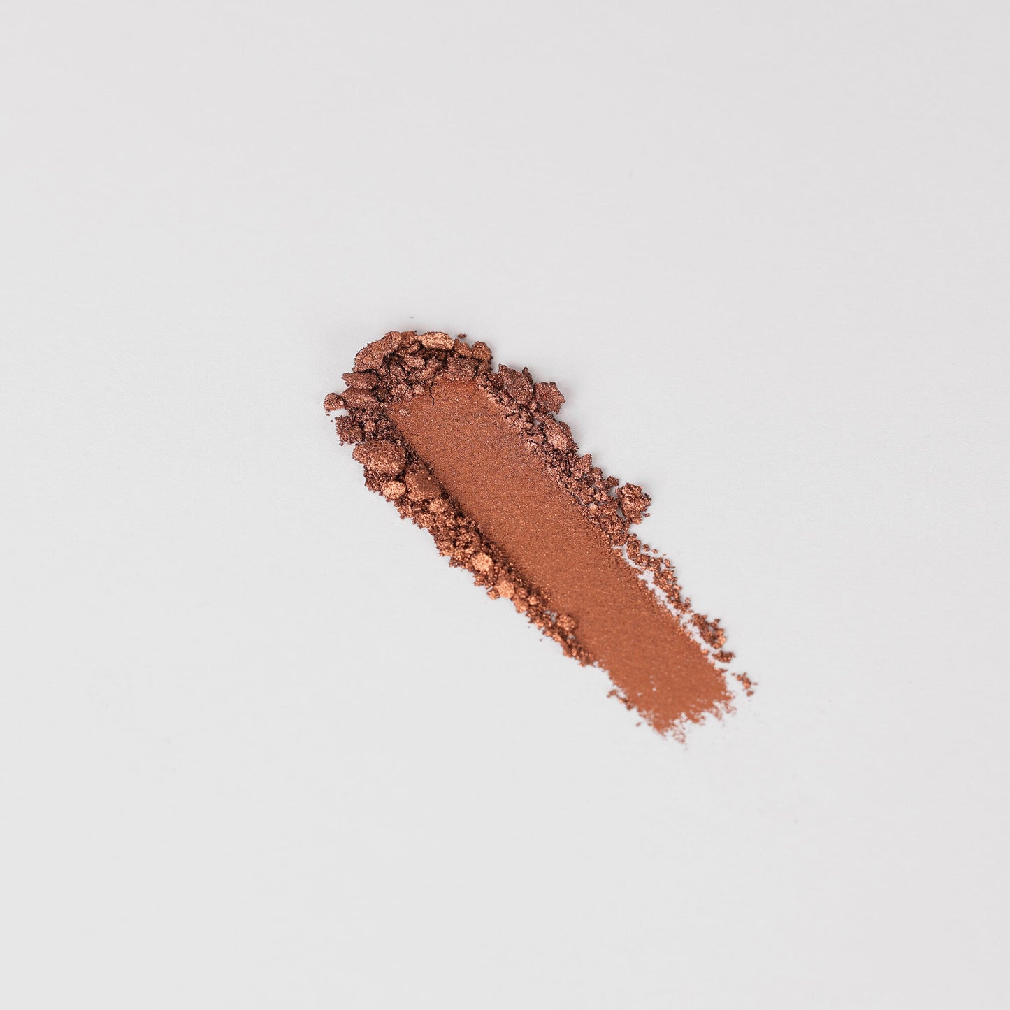 Glow Pressed Eyeshadow with luminous brown pigment for a smooth, creaseless application, buildable to bold or soft shimmer looks.